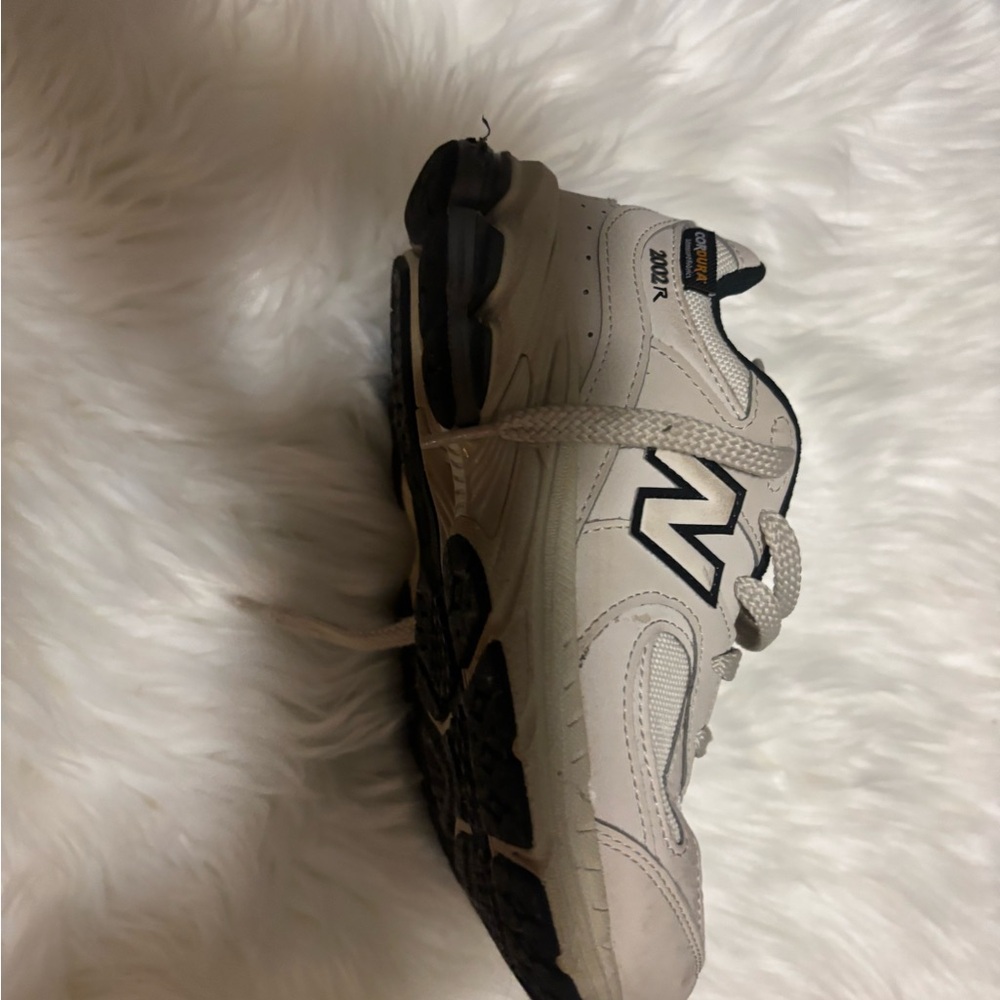 New Balance Black and White Athletic Shoes